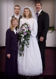 Kristina with her Parents and her Brother, Erick.
